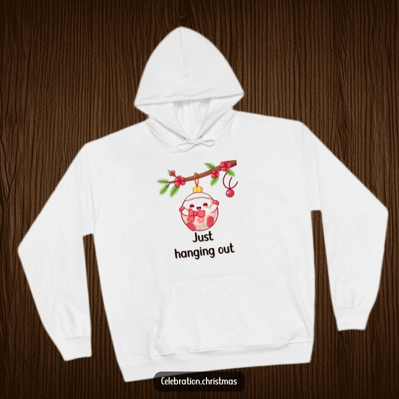 Funny kawaii Christmas ornament hoodie featuring a gleeful character swinging, perfect for staying warm and festive.