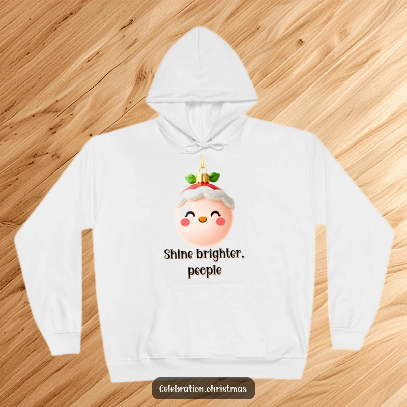 Funny cute Christmas ornament hoodie featuring a cheerful, sparkling face, ideal for winter coziness and a great funny gift.
