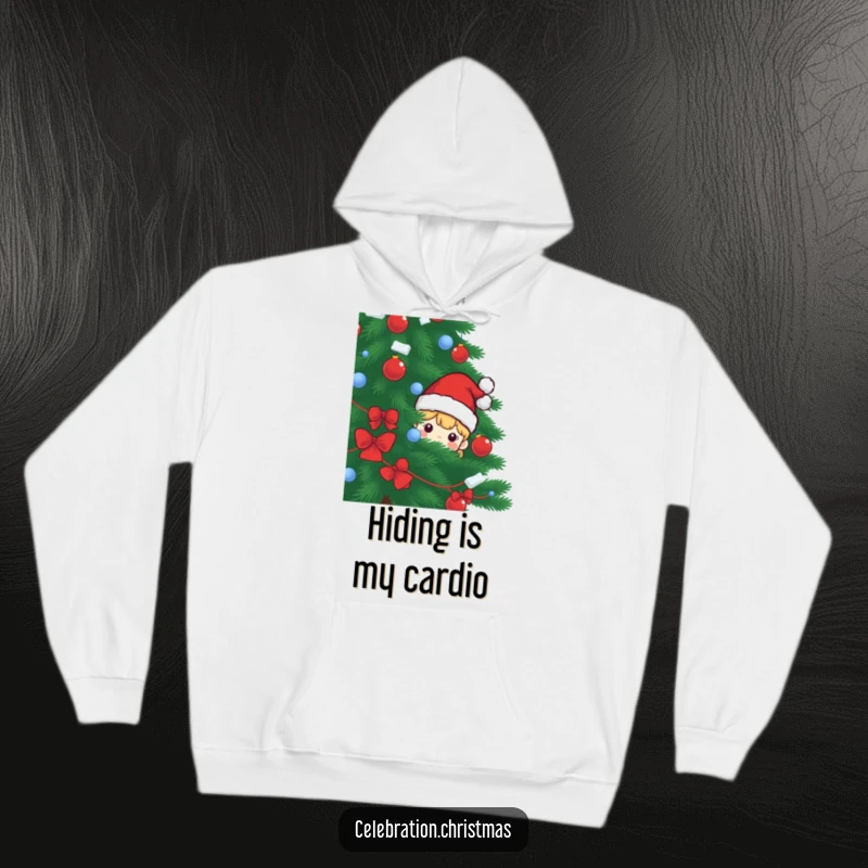 Funny hoodie showcasing a shy Santa hat character peeking out from behind a giant Christmas tree, bringing festive and humorous vibes.
