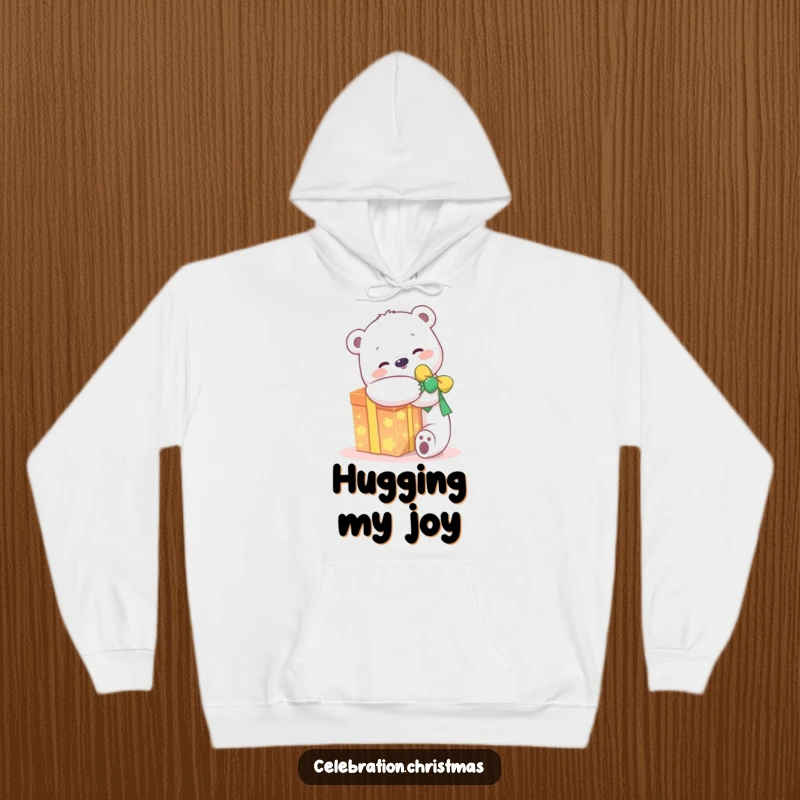 Funny kawaii polar bear hoodie featuring a joyful character hugging a glowing present, perfect for cozy and happy wear.