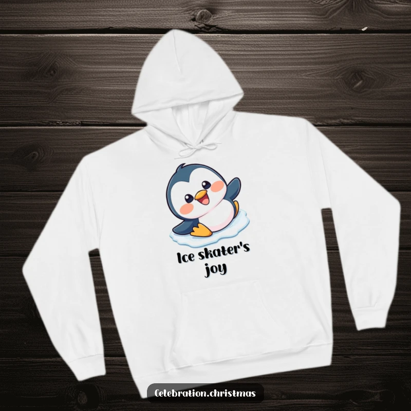 Funny, happy kawaii penguin slipping and sliding on ice with a big grin on a cozy hoodie.