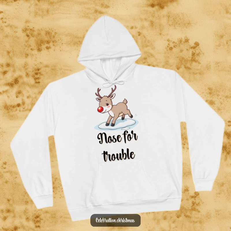 Funny reindeer hoodie, showing a reindeer with a glowing red nose comically slipping on ice, perfect for winter warmth.